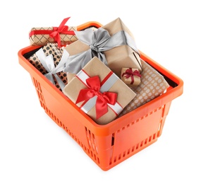 Orange shopping basket with different gifts on white background