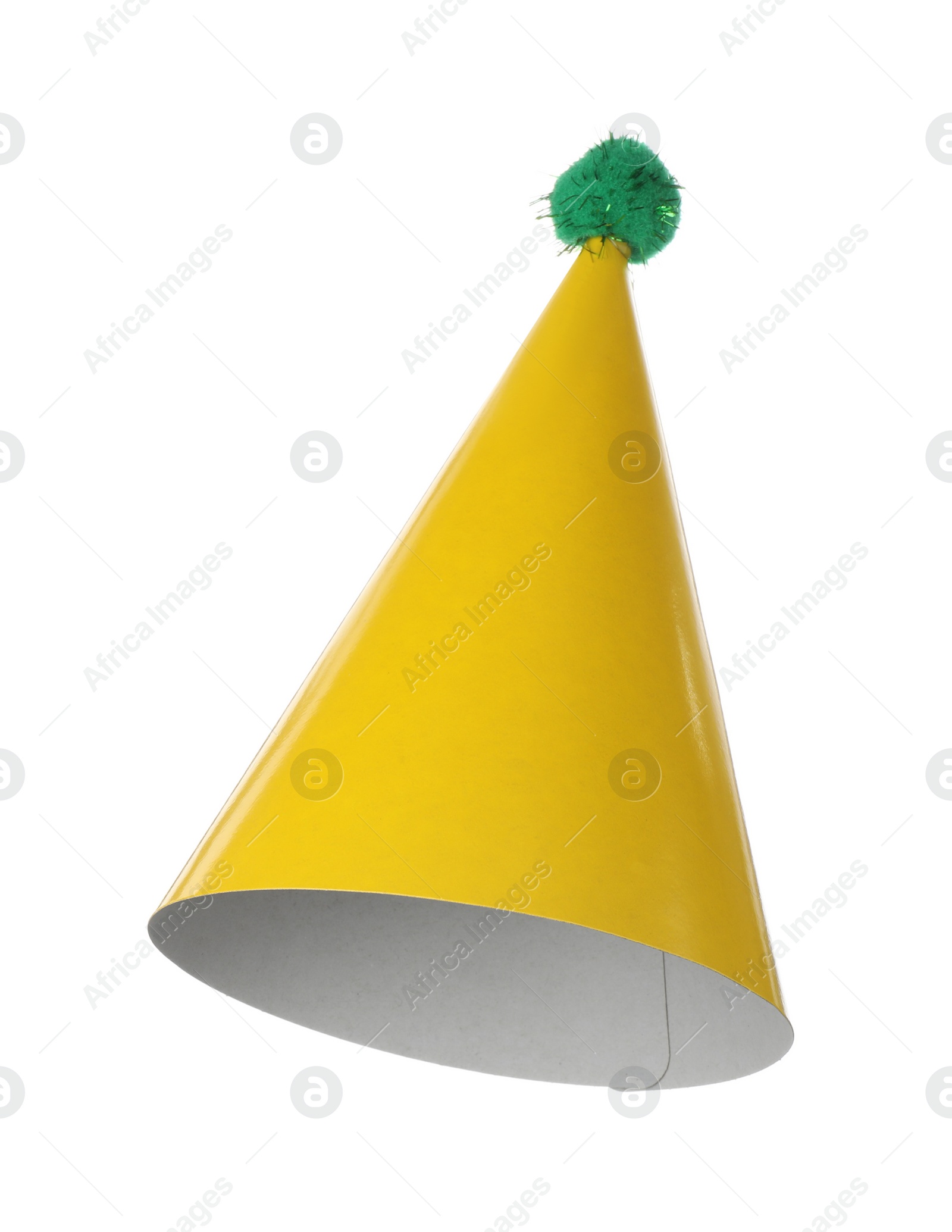 Photo of One yellow party hat isolated on white