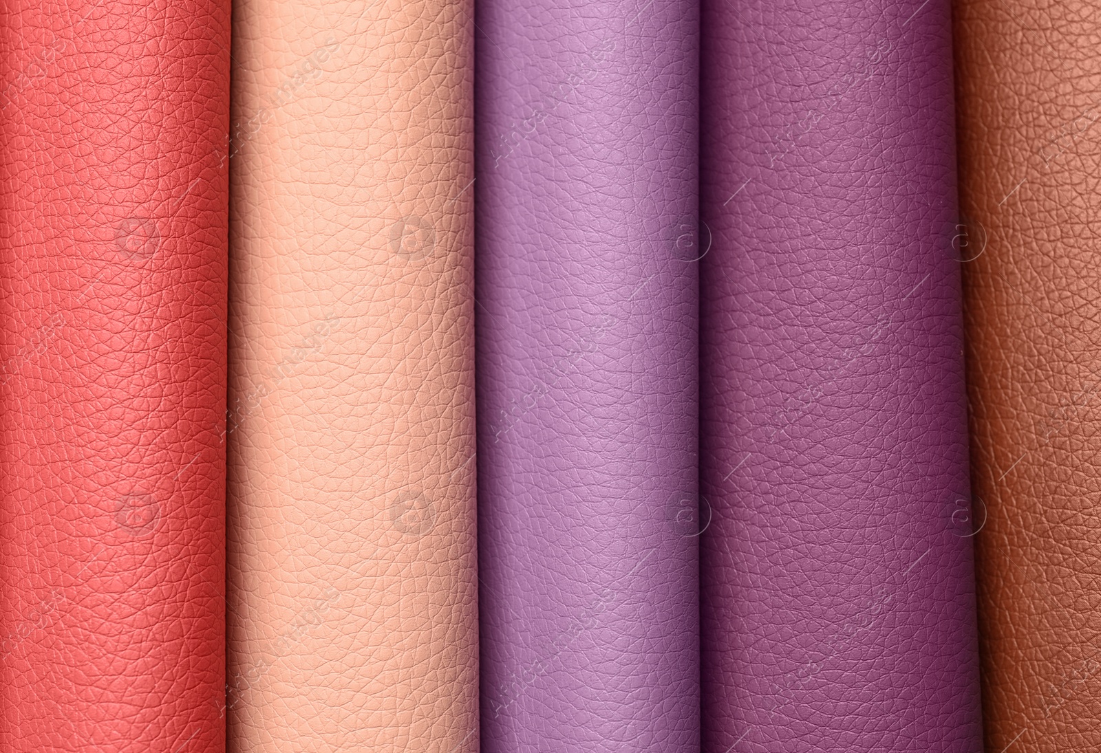 Photo of Leather samples of different colors for interior design as background