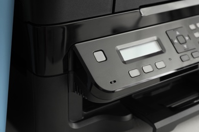 Closeup view of new modern printer with control panel