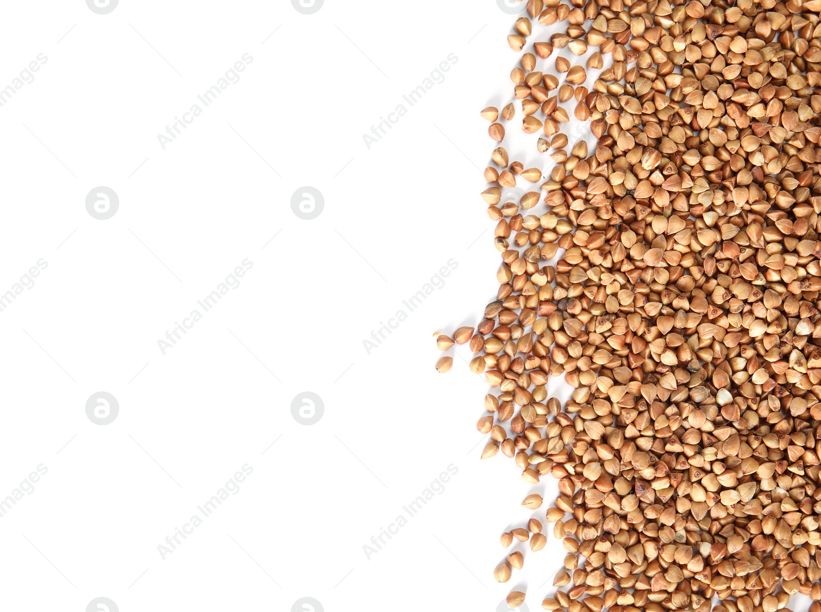 Photo of Uncooked buckwheat on white background, top view