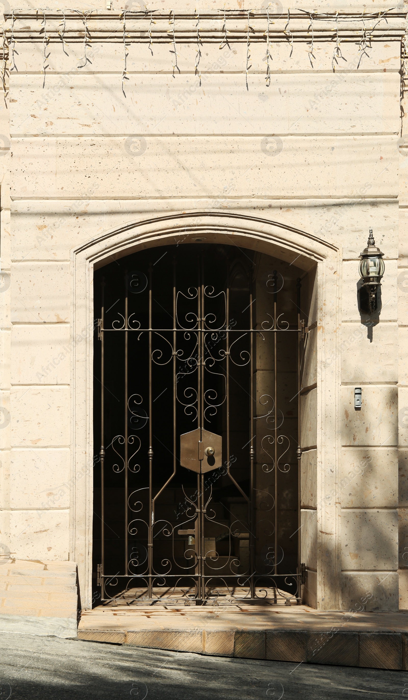 Photo of Entrance of building with beautiful old black gates