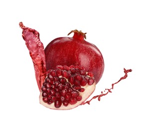 Image of Fresh ripe pomegranate and splash of juice on white background