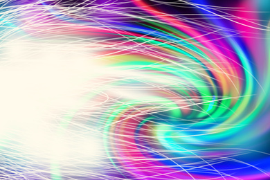 Blurred view of abstract bright colorful background with sparks