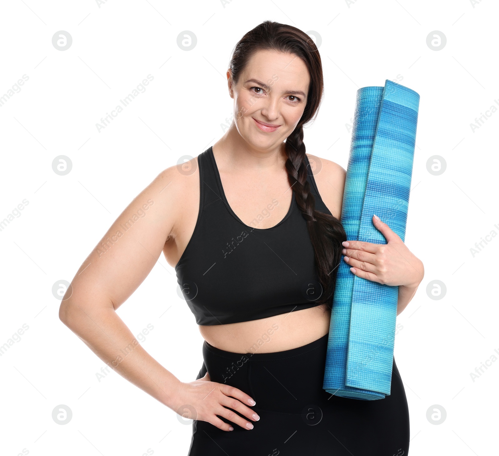 Photo of Happy overweight woman with yoga mat on white background