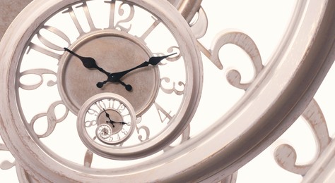 Image of Infinity and other time related concepts, banner design. White clock face twisted in spiral, fractal pattern