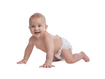 Photo of Cute baby in dry soft diaper crawling on white background