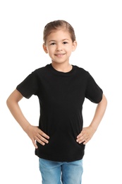 Photo of Little girl in t-shirt on white background. Mockup for design