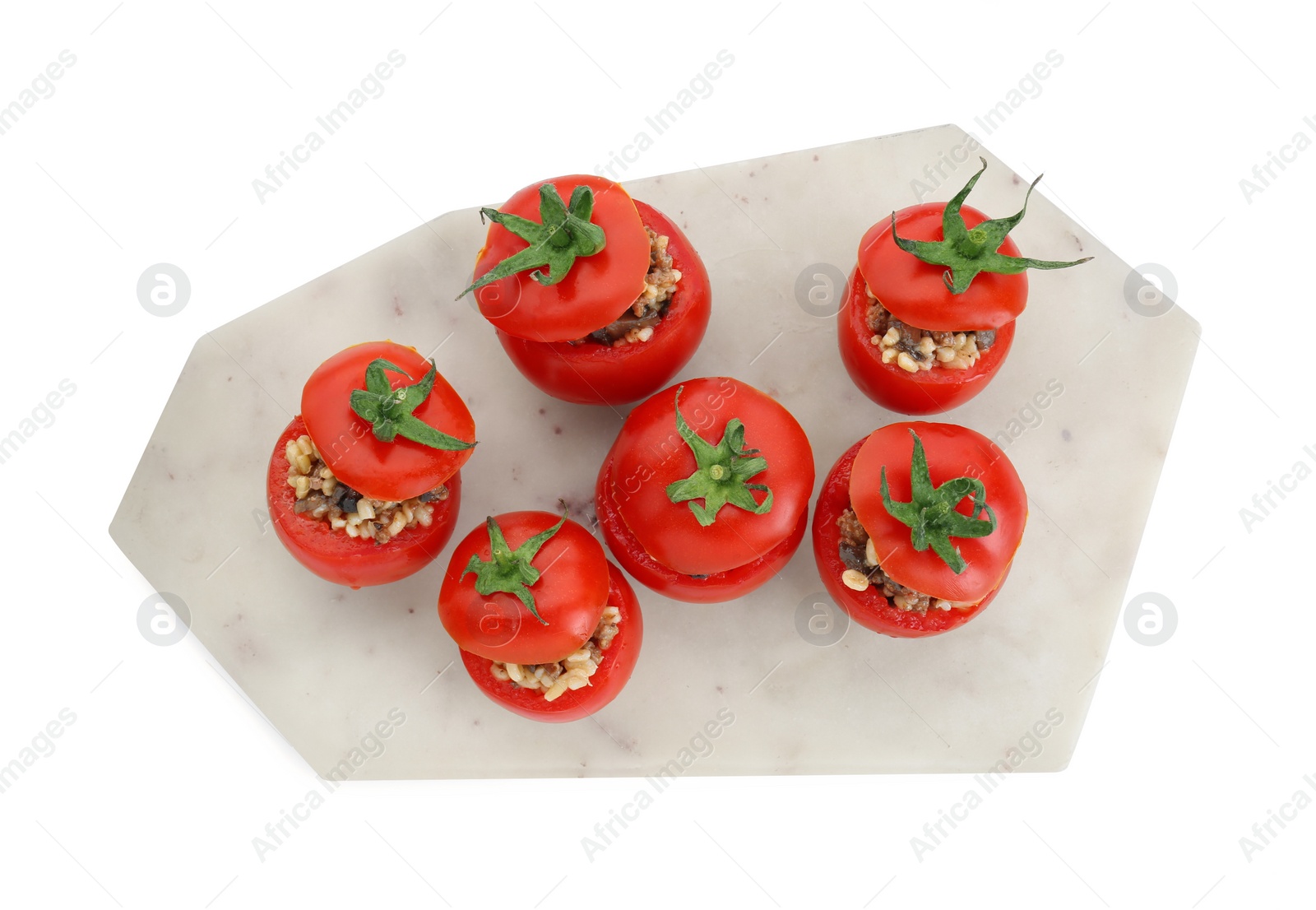 Photo of Delicious stuffed tomatoes with minced beef, bulgur and mushrooms isolated on white, top view