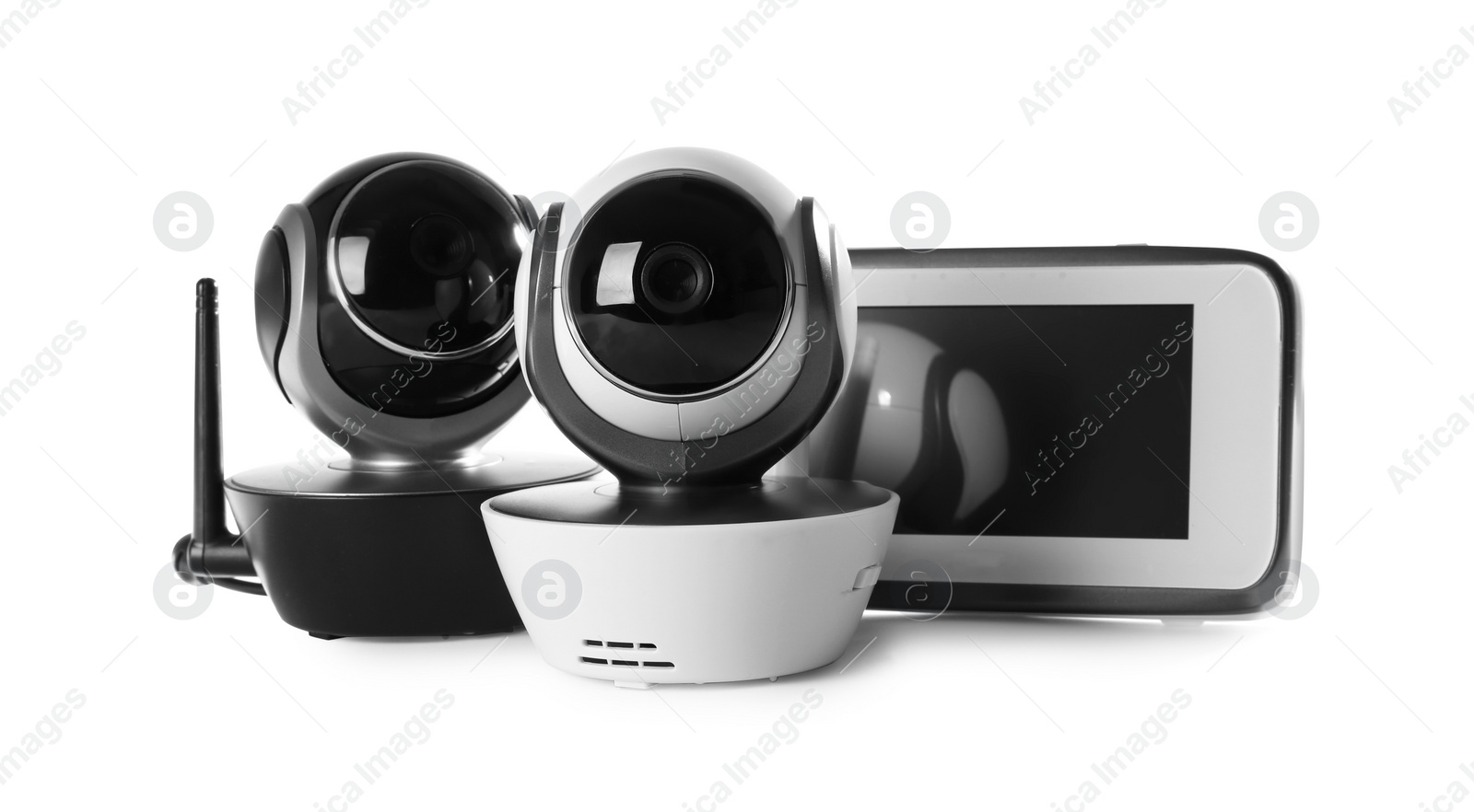 Photo of Modern CCTV security cameras and monitor on white background. Space for text