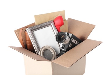 Photo of Box of unwanted stuff isolated on white