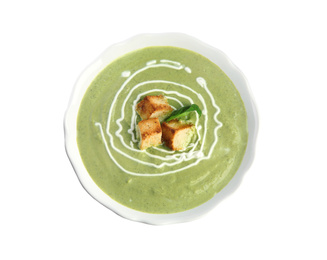 Delicious broccoli cream soup with croutons isolated on white, top view