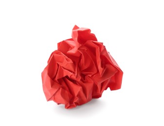 Photo of Crumpled sheet of red paper isolated on white