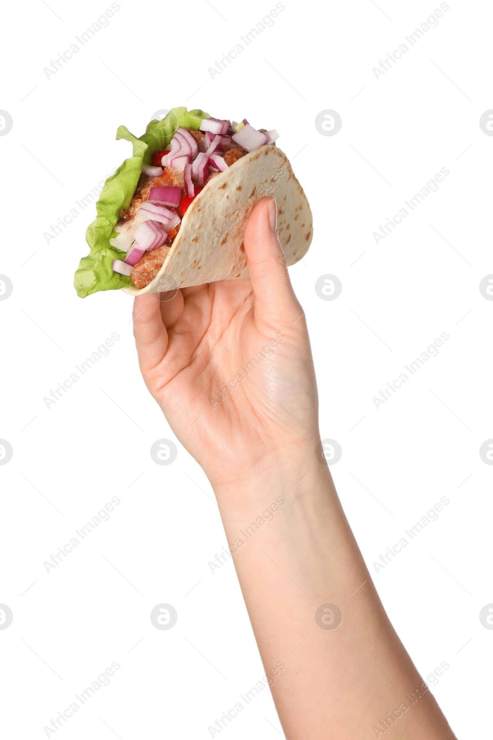 Photo of Woman holding delicious taco with meat and vegetables on white background, closeup