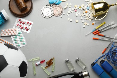 Photo of Frame of drugs on light grey background, flat lay with space for text. Doping control