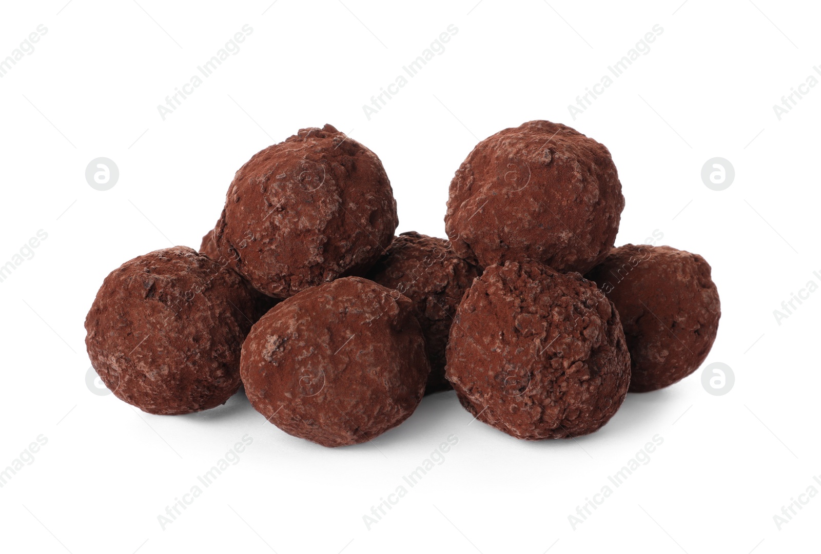 Photo of Tasty chocolate truffle candies isolated on white