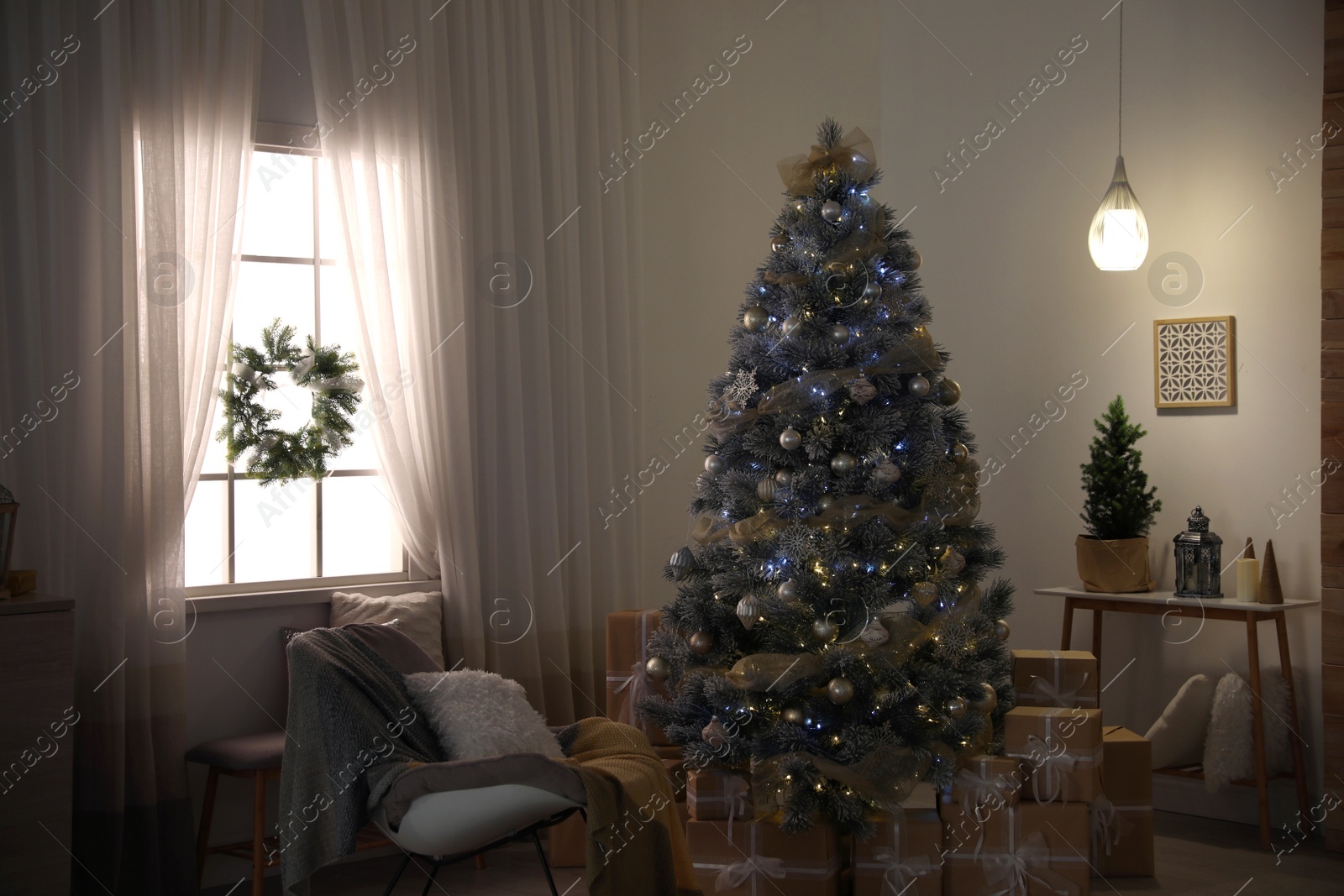 Photo of Beautiful interior of living room with decorated Christmas tree