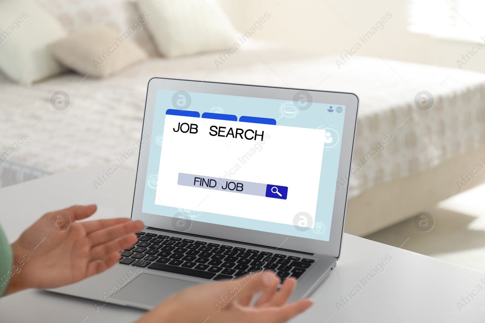 Image of Woman working with modern laptop at white table indoors, closeup. Job search