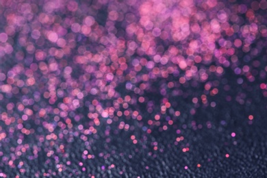 Photo of Magic pink bokeh effect on dark background