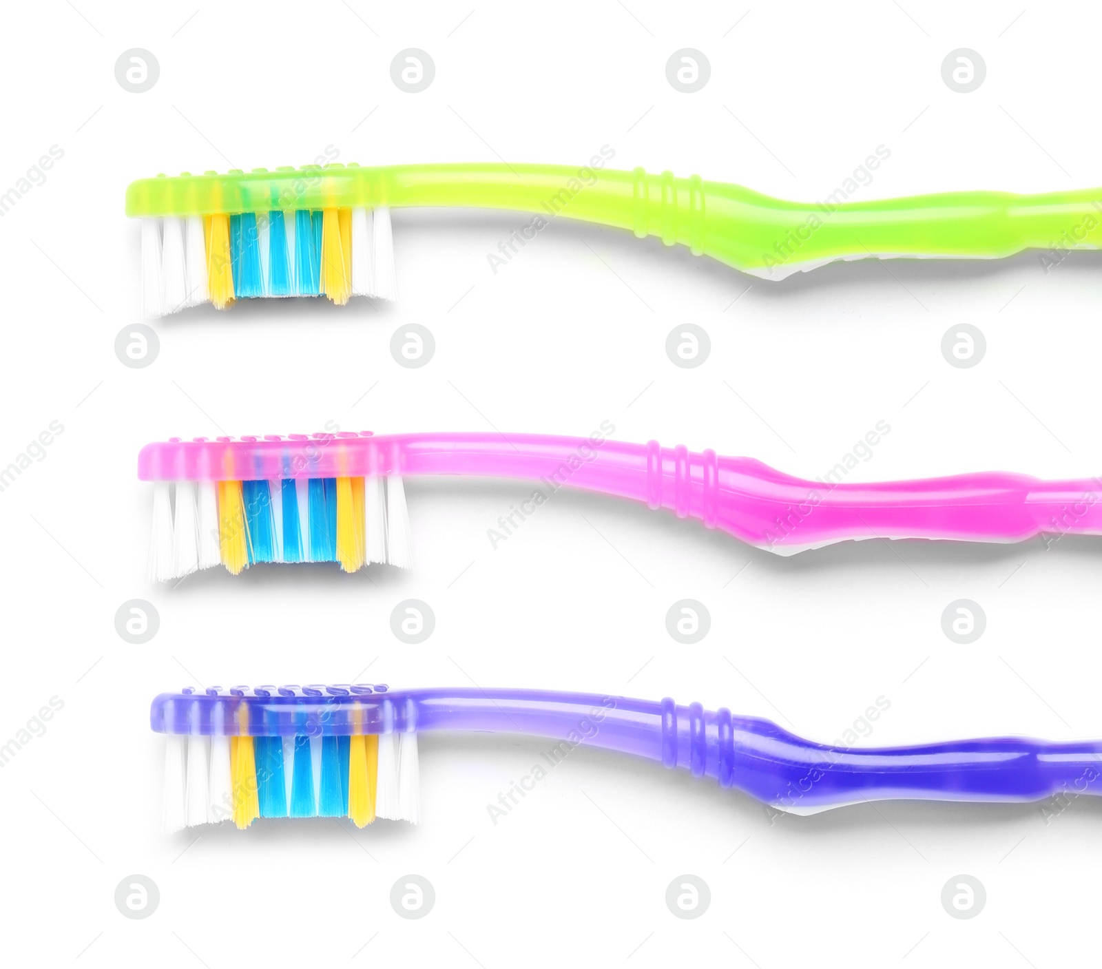 Photo of Color toothbrushes on white background. Dental care