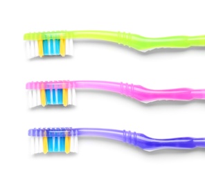 Photo of Color toothbrushes on white background. Dental care