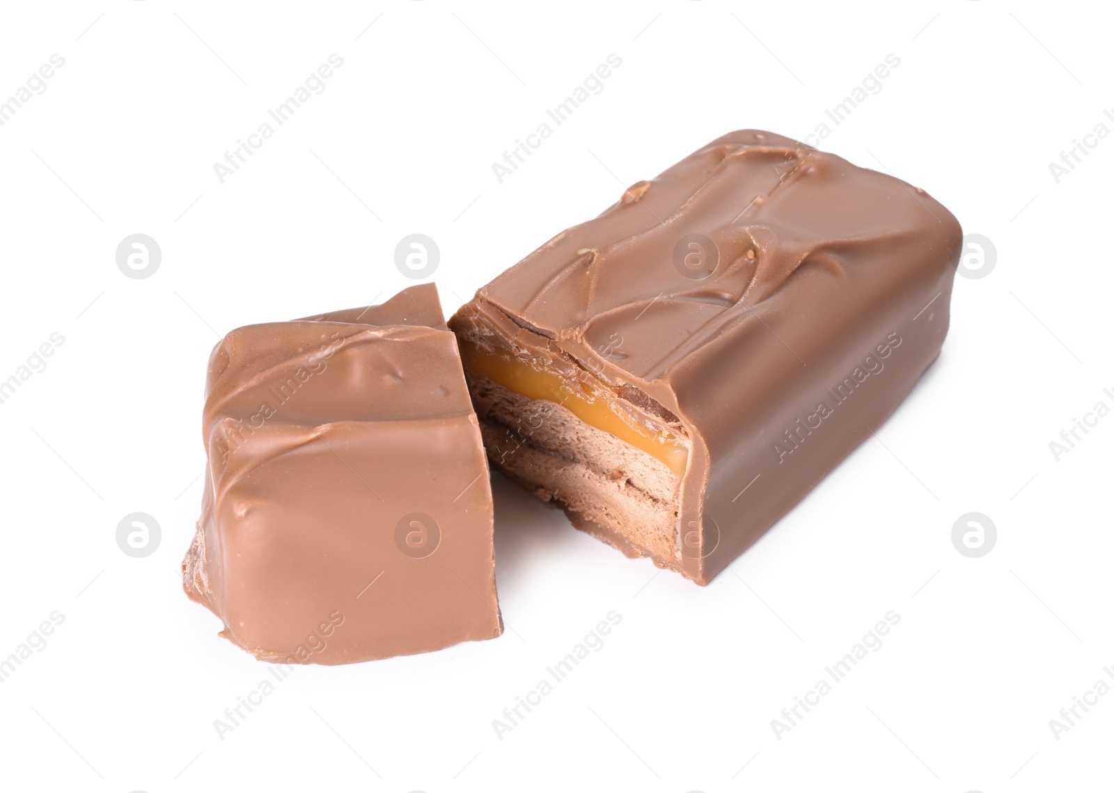 Photo of Pieces of tasty chocolate bars with nougat on white background