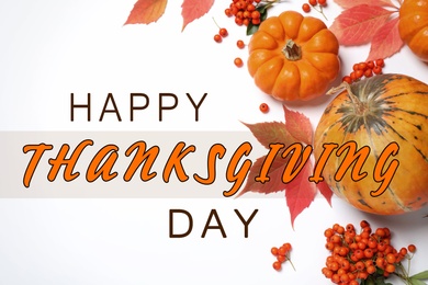 Happy Thanksgiving Day card. Flat lay composition with pumpkins, berries and autumn leaves on white background