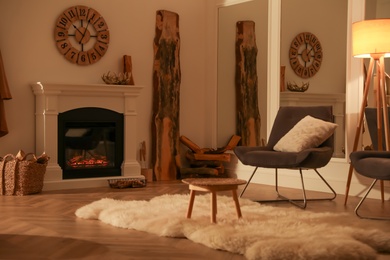 Photo of Beautiful view of cozy living room interior with fireplace