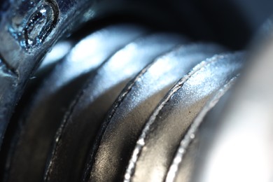 Photo of Texture of modern metal fasteners, macro view