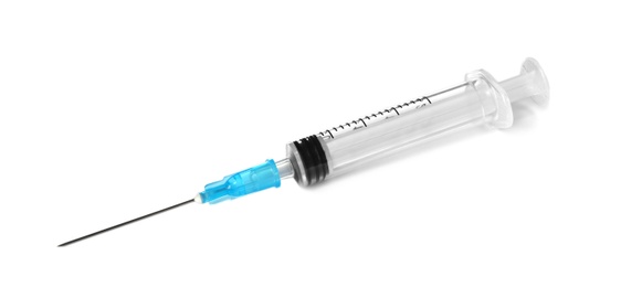 Photo of Plastic syringe on white background. Medical instrument