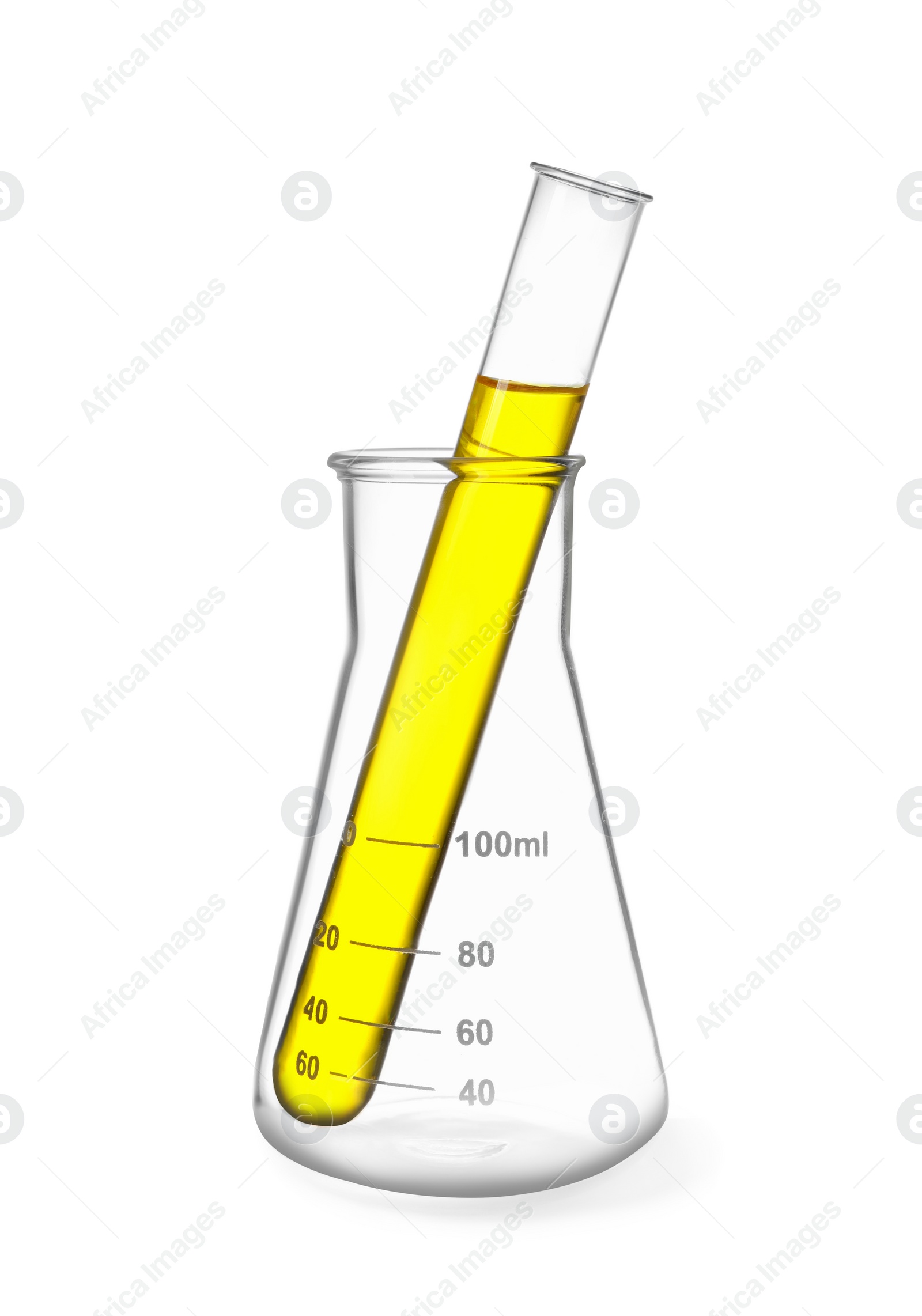 Image of Glass flask and test tube with yellow liquid isolated on white