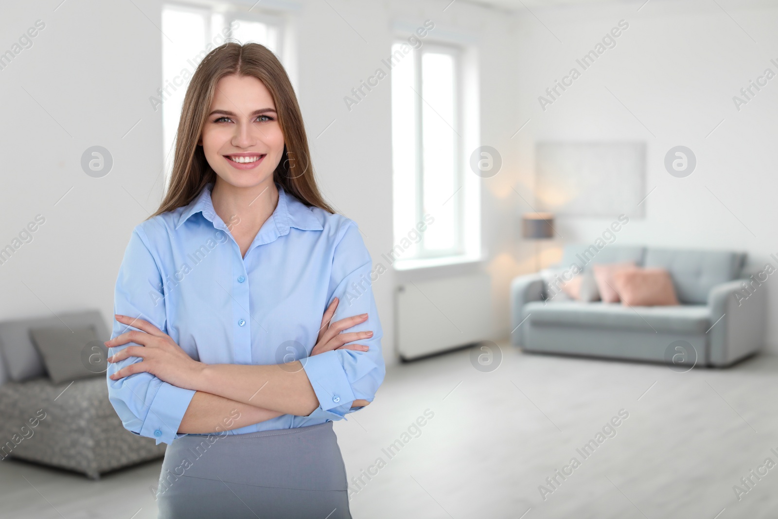 Photo of Beautiful real estate agent indoors