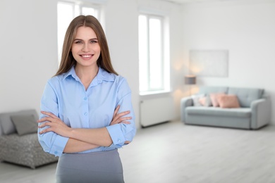 Beautiful real estate agent indoors