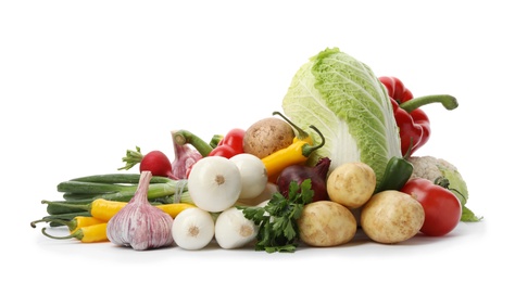 Photo of Different fresh ripe vegetables isolated on white