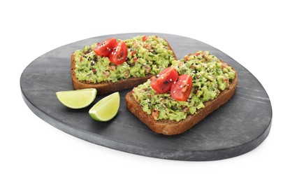 Photo of Slices of bread with tasty guacamole and lime isolated on white