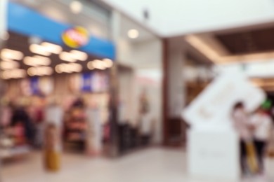 Photo of Blurred view of shopping mall interior. Bokeh effect