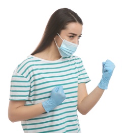 Photo of Woman with protective mask and gloves in fighting pose on white background. Strong immunity concept