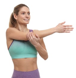 Photo of Portrait of sportswoman stretching on white background