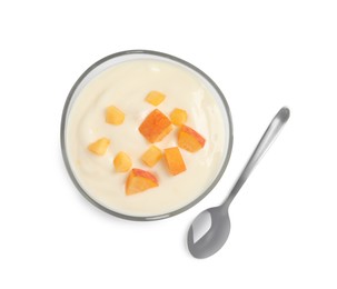 Photo of Delicious yogurt with fresh peach in glass bowl and spoon on white background, top view