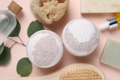 Photo of Flat lay composition with bath bombs on beige background
