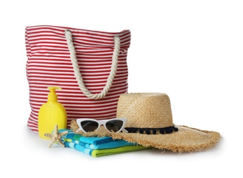 Photo of Set of different beach accessories isolated on white