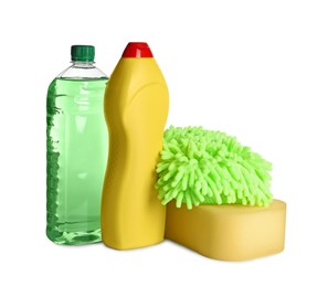 Photo of Bottles, sponge and car wash mitt on white background