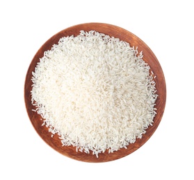 Plate with uncooked rice on white background, top view