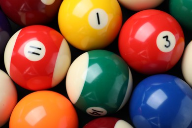 Many colorful billiard balls as background, top view