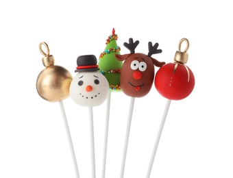 Photo of Delicious Christmas themed cake pops isolated on white