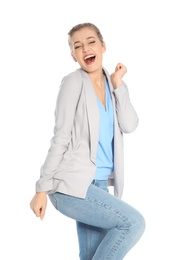 Young woman celebrating victory on white background