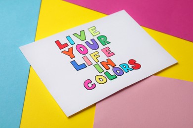 Photo of Words Live Your Life In Colors on bright colorful background