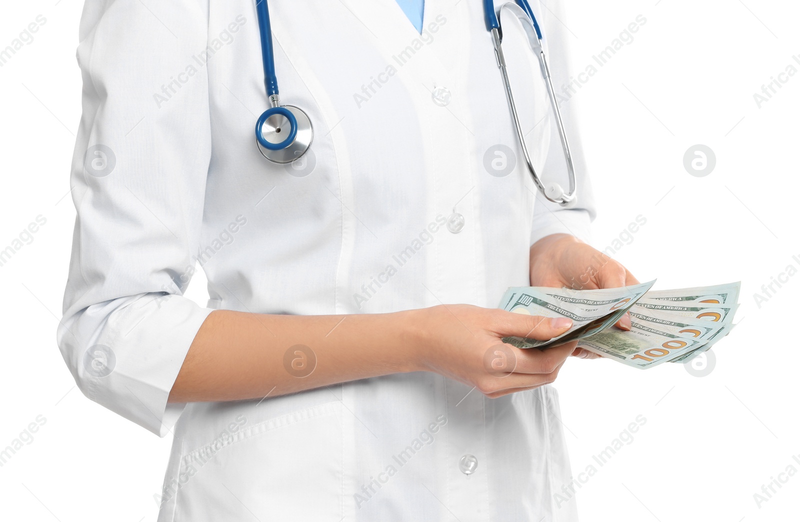 Photo of Doctor with bribe on white background, closeup. Corruption in medicine