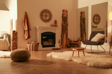 Photo of Beautiful view of cozy living room interior with fireplace