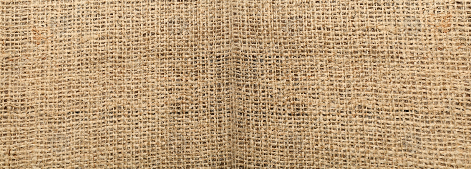 Image of Texture of natural burlap fabric as background, top view. Banner design